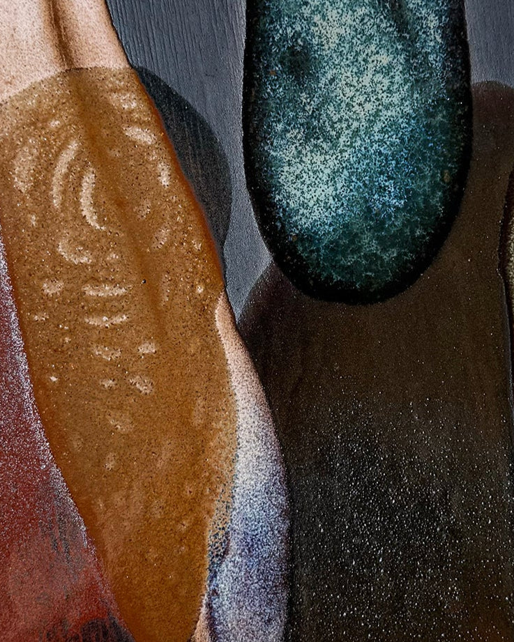 Abstract art piece with textured colors on a textured white background