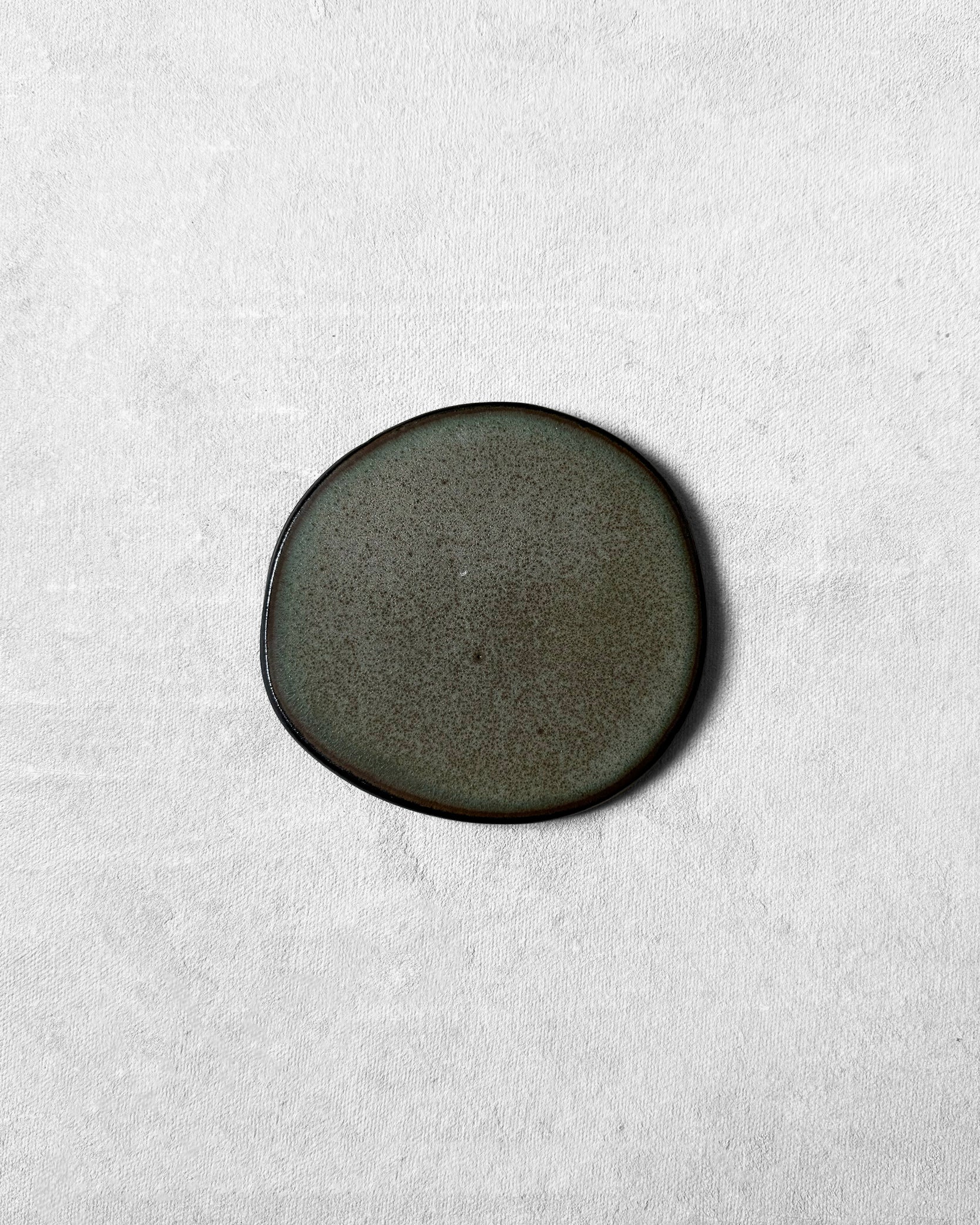 Coaster in Speckled Anthrazit